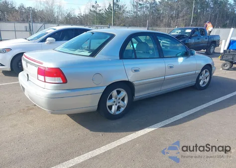 2000 Cadillac Catera Standard z USA, uszkodzony, nr VIN W06VR54R4YR103884